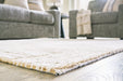 Adanmund Beige/Caramel 5' x 7' Rug - R406412 - Vega Furniture