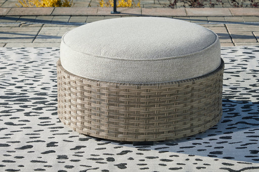 Calworth Beige Outdoor Ottoman with Cushion - P458-814 - Vega Furniture