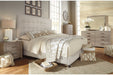 Dolante Beige Queen Upholstered Bed - B130-581 - Vega Furniture