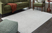 Eduring Ivory/Taupe Large Rug - R406691 - Vega Furniture