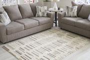 Leesdale Ivory/Brown/Black 5' x 7' Rug - R406422 - Vega Furniture