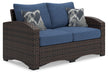 Windglow Blue/Brown Outdoor Loveseat with Cushion - P340-835 - Vega Furniture